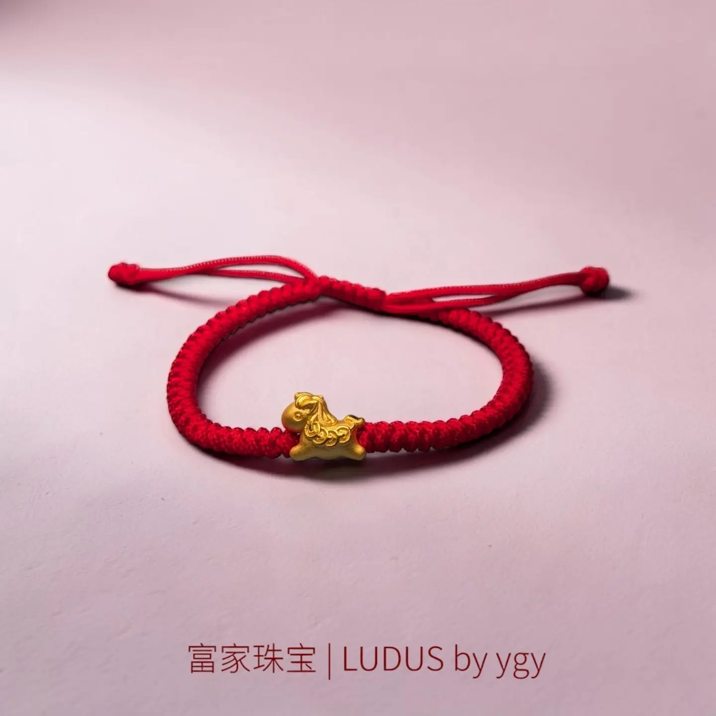 Red Cord Gold Animal Bracelet