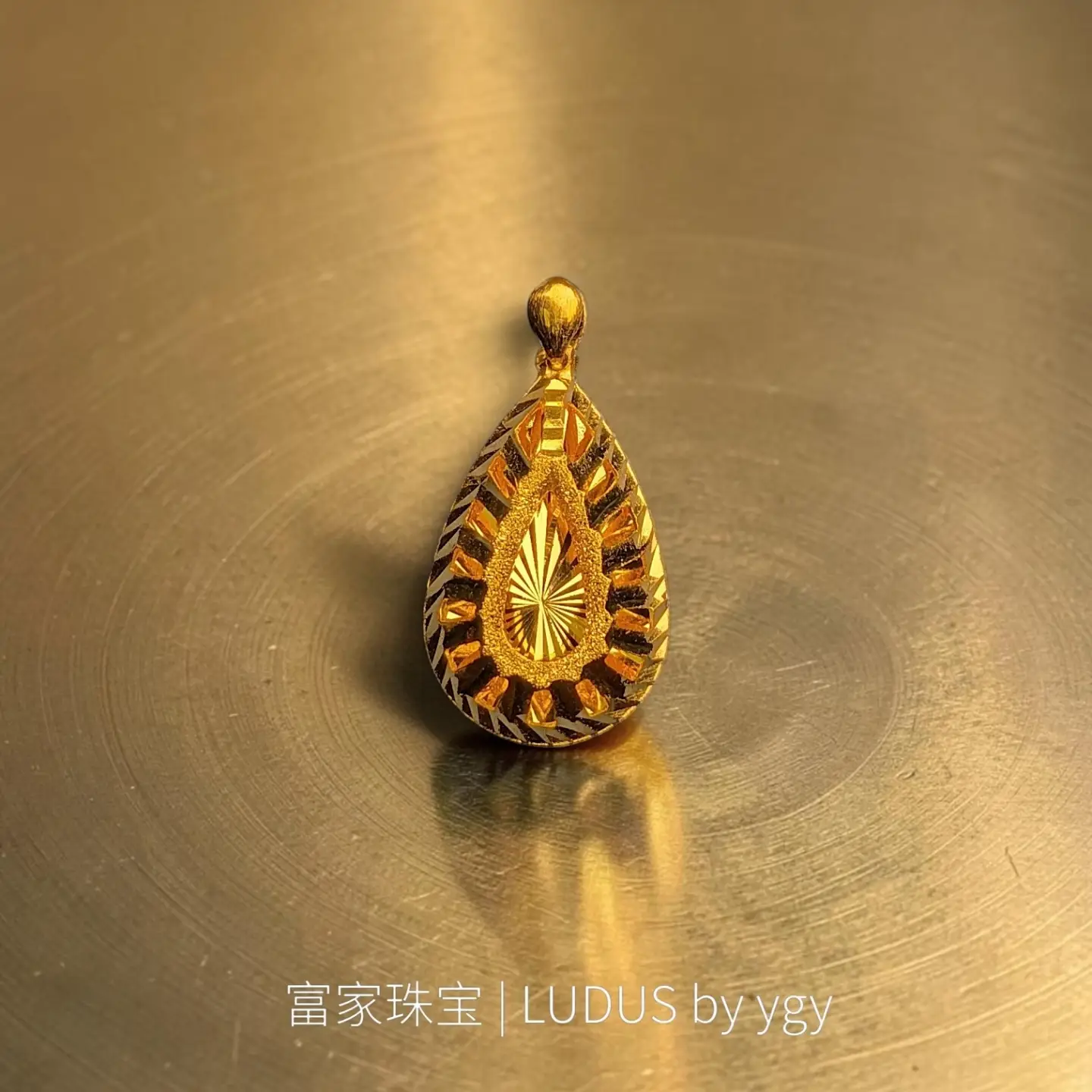 Intricate Teardrop Gold Pendant